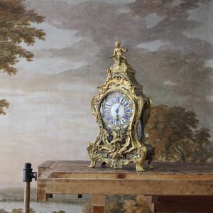 Restauration d'un cartel d'époque Louis XV en marqueterie Boulle