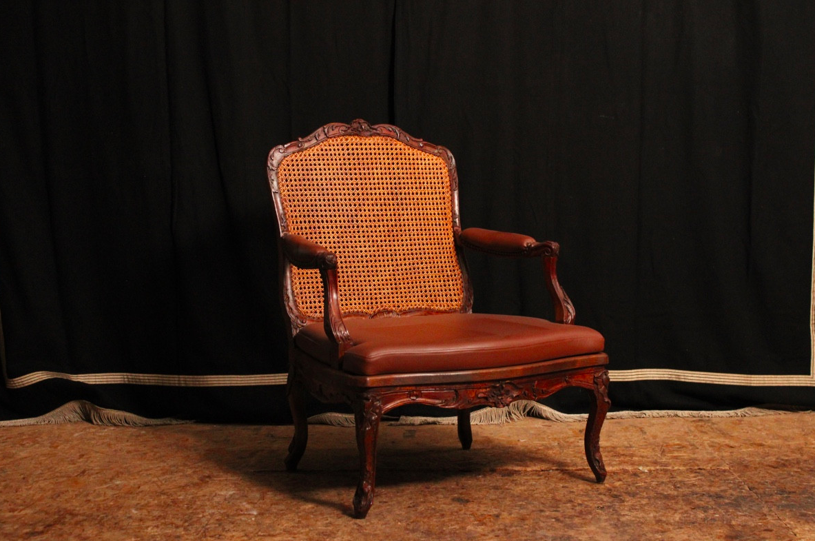 Fauteuil à la reine de style Régence canné en hêtre, XIXe siècle